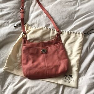 pink Coach cross body bag